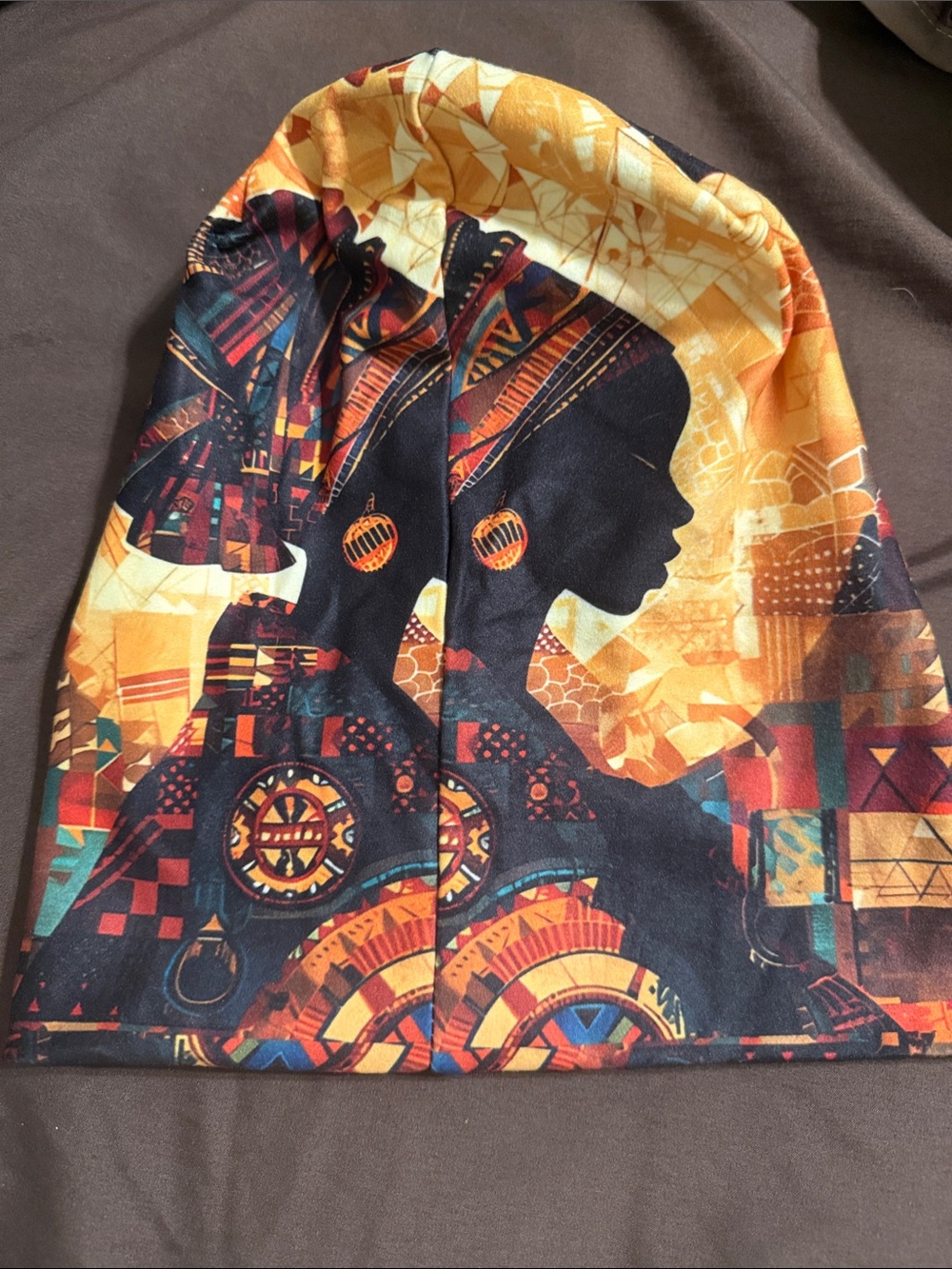 African Silhouette Pattern Beanie - Vibrant Orange & Black